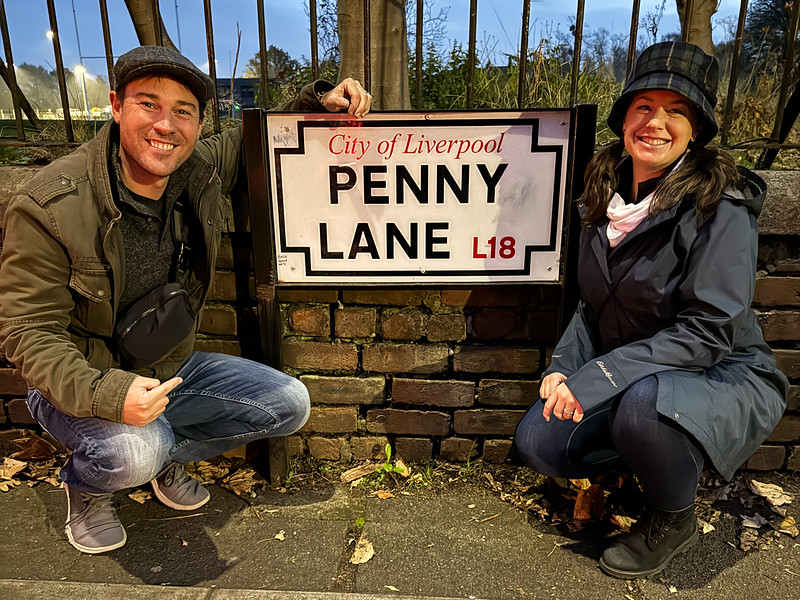Lina and David Stock with the Penny Lane sign in Liverpool, England