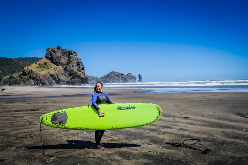 Lina Stock of 8 Wonders of the World Adventure Travel Blog on Piha Beach Surfing in New Zealand