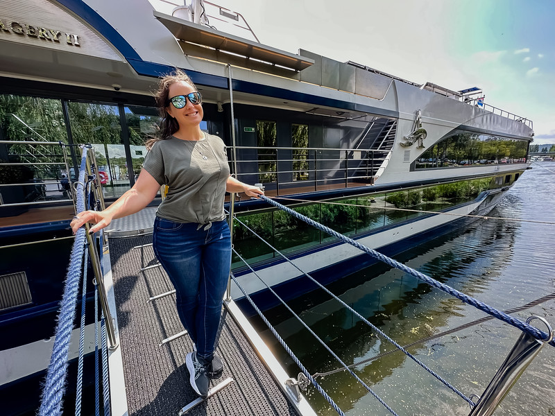 Lina Stock standing in front of the Avalon Waterways Imagery II river ship in Europe