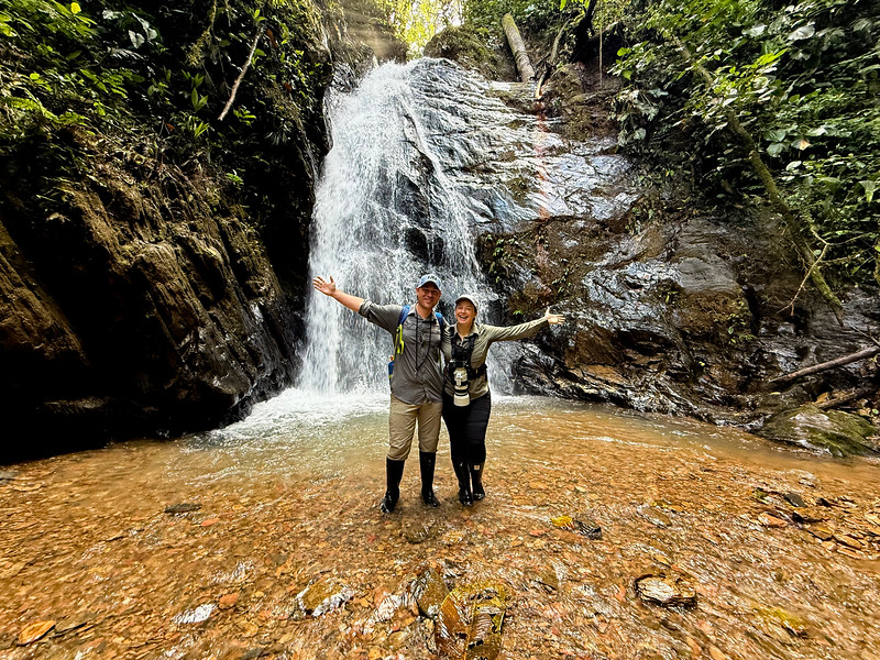 8 Wonders of the World, Lina and David Stock near a waterfall at Mashpi Lodge, Ecuador